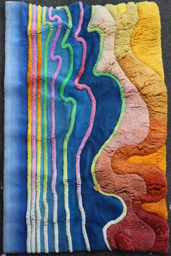 A modern polychrome deep pile wall hanging, designed and made by Ron Nixon, 9ft 3in by 6ft 6in.